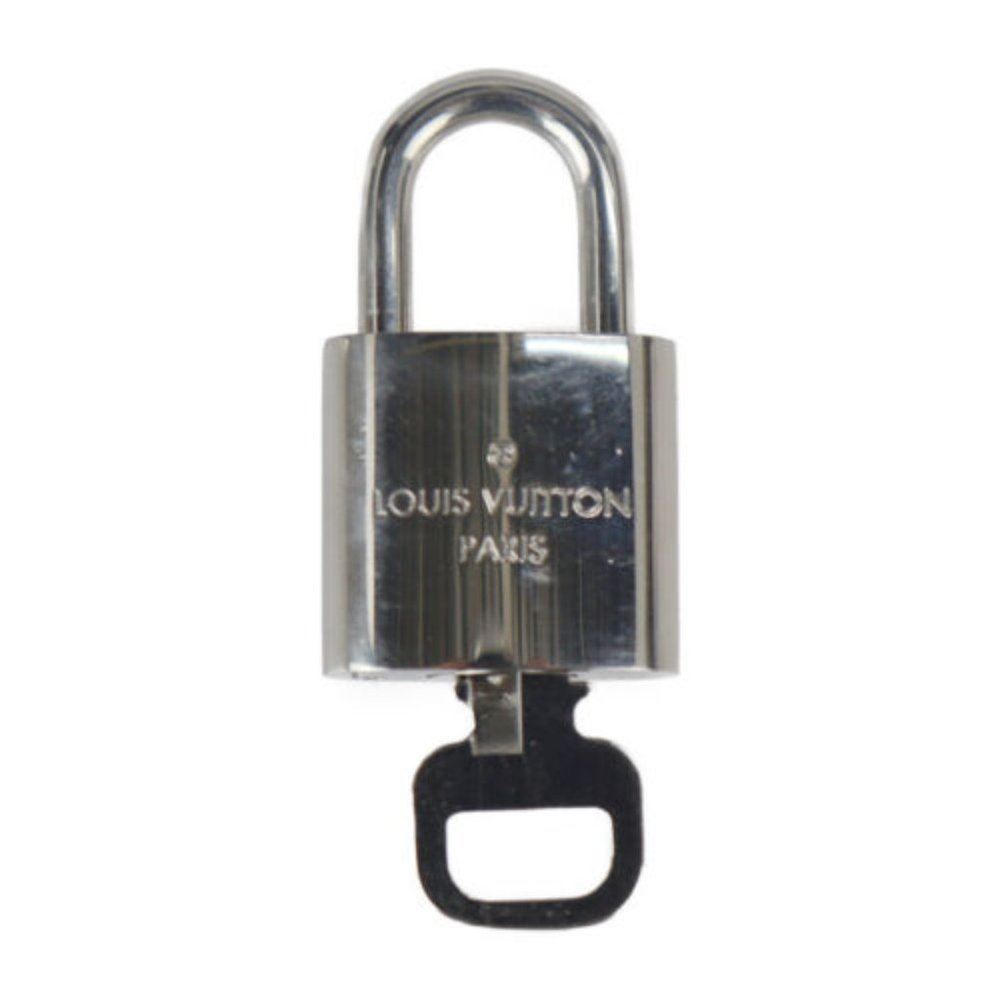 $700 Louis Vuitton Silver Padlock Lock and Key and chain. Never used